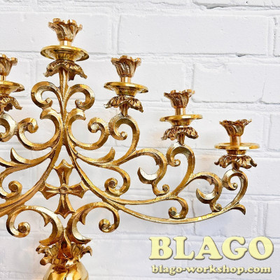 Seven candlesticks on the table, medium for candles, 53x17x43 cm