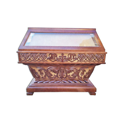 The church tomb is made of wood under the shroud, tinted with varnish The church tomb is made of wood under the shroud, tinted with varnish