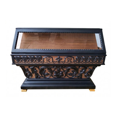 The church tomb is made of wood under the shroud, tinted with varnish The church tomb is made of wood under the shroud, tinted with varnish