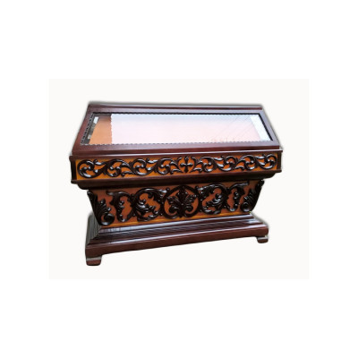 The church tomb is made of wood under the shroud, tinted with varnish The church tomb is made of wood under the shroud, tinted with varnish