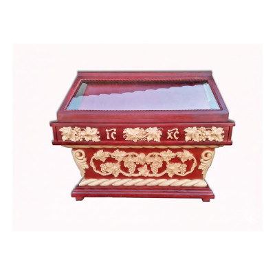 The church tomb is made of wood under the shroud, tinted with varnish The church tomb is made of wood under the shroud, tinted with varnish