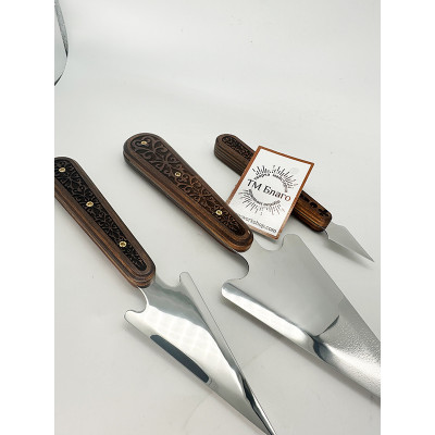 Набір копіє з дерев'яними, різьбленими ручками в футлярі
