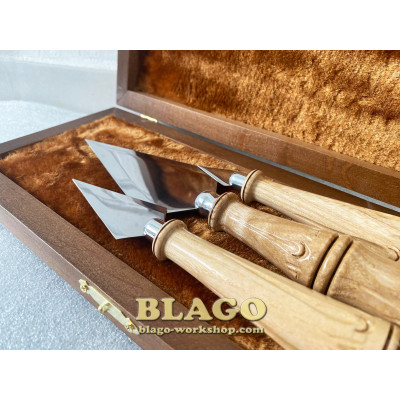 Liturgical spear set with wooden, carved handles and metal crosses in a wooden case