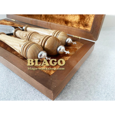 Liturgical spear set with wooden, carved handles and metal crosses in a wooden case